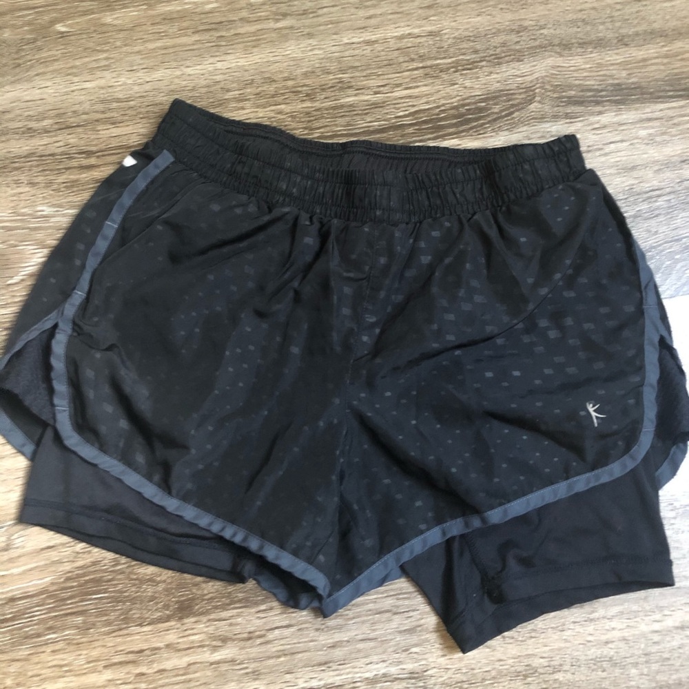 black athletic shorts with compression